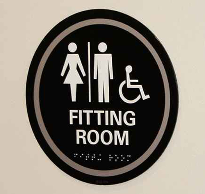 Znak dotykowy z dwiema osobami stojącymi i osobą na wózku inwalidzkim