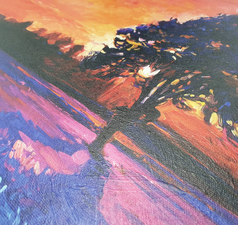 A close-up of a printed painting showing simulated brushstrokes