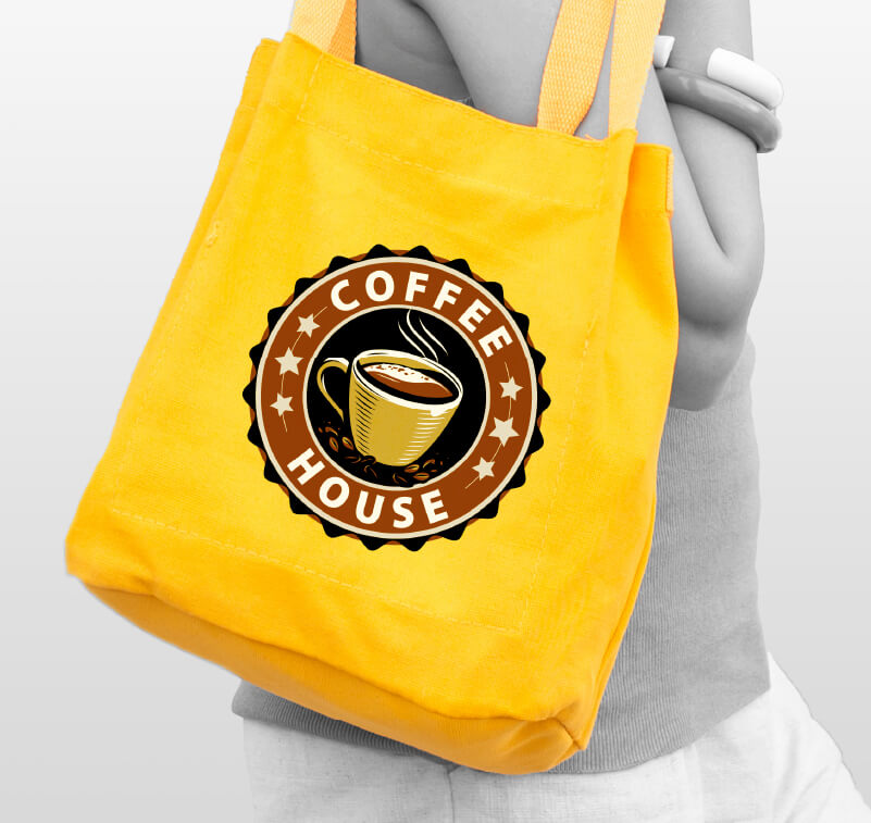 A canvas shopping bag with a printed logo