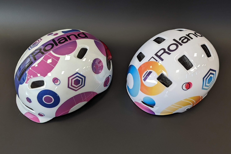 A pair of helmets with different designs