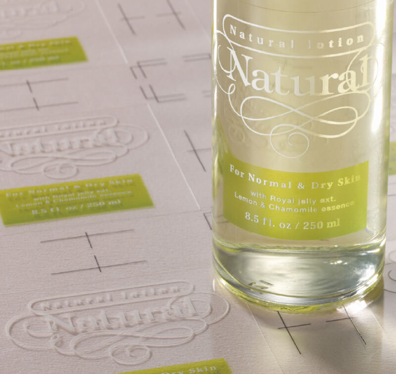 Close up of transparent labels printed with white ink