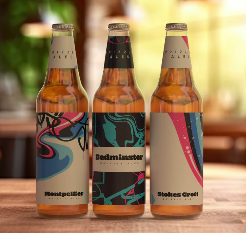 Drei Bierflaschen mit kundenspezifischen Etiketten in limitierter Auflage