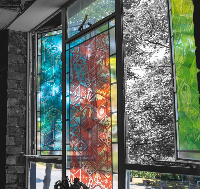 Printed transparent film creating a stained glass effect.