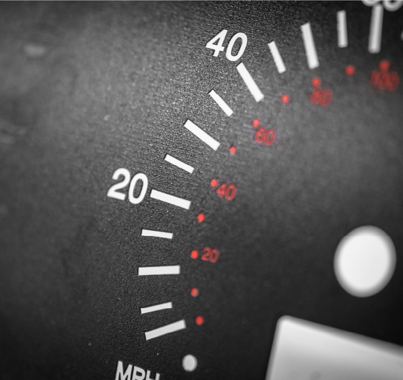 A close-up of a speedometer printed with UV ink