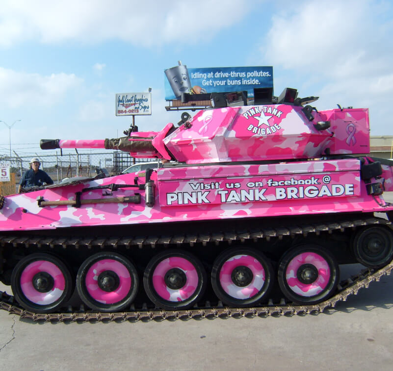 A tank with printed pink graphics