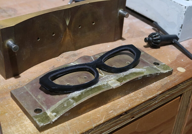 …and is bent into shape by heating it in a mould.