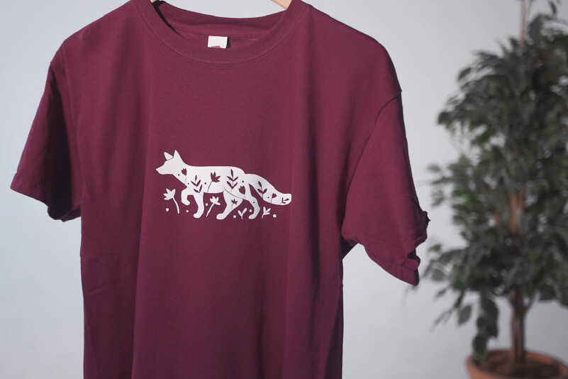 A completed custom T-shirt with a flock fox design