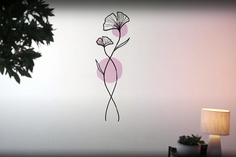 Um autocolante de parede com um design floral