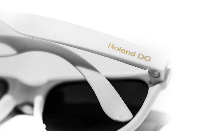 Logo on plastic sunglasses produced by laser foiling