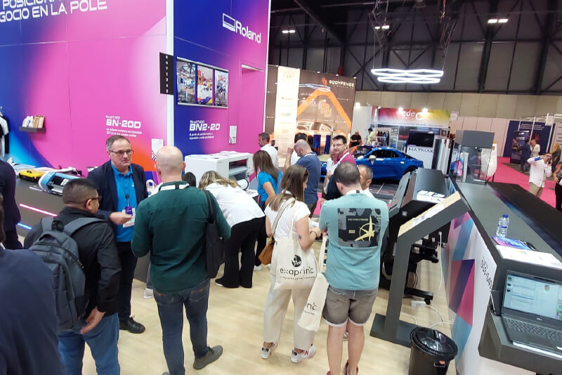 Attendees at a print hardware tradeshow searching for their next investments.