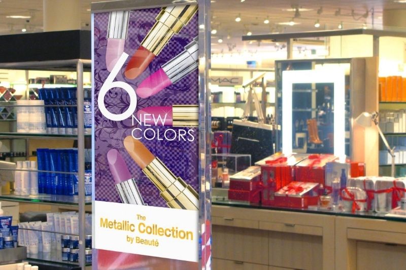 Poster printed with metallic ink using a Roland digital printer for a make-up display counter