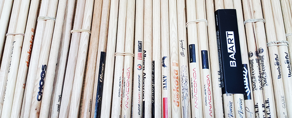 BAART prints logos, names and designs onto its handmade drumsticks 
