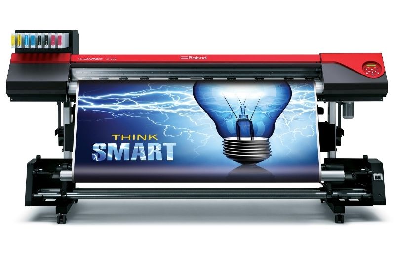Roland VersaEXPRESS RF-640 with take-up unit and smart light bulb image printed on the front of the media