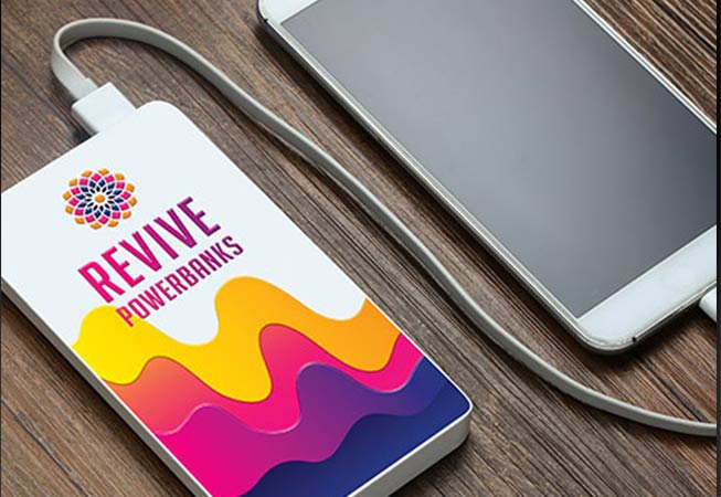 Revive Powerbank showing UV printed logo and yellow, orange, pink and purple colourful design