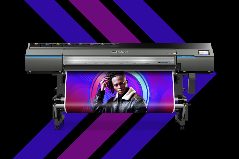 Upgrade your business - Banner showing a model of Roland DG's TrueVIS VG Series