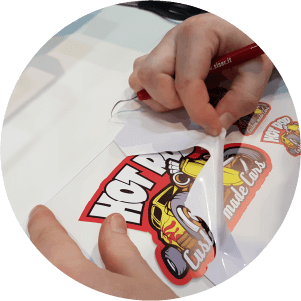 weeding excess material from a print-and-cut sticker