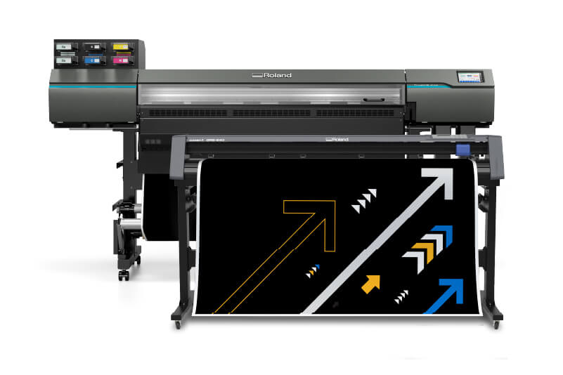una impresora digital y un cortador de gran formato